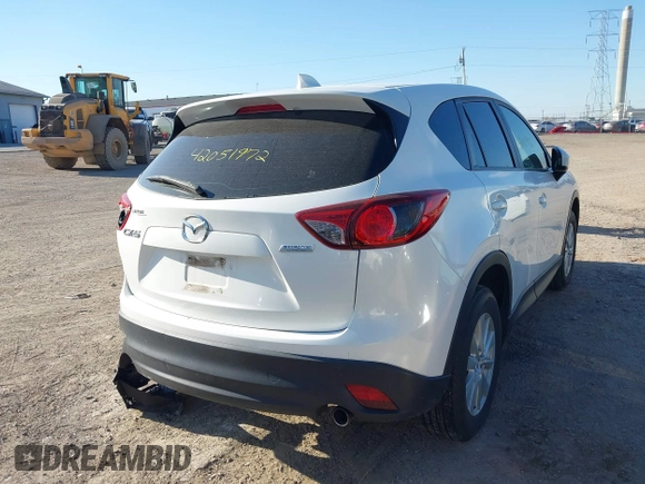 2014 Mazda CX-5 Sport with VIN JM3KE2BE8E0301175, listed as a IAAI auction lot 42051972 with 121,821 mi miles and . Bid and sale history available at carsss.com. Image 4.
