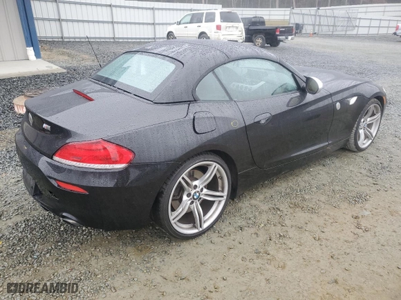 2011 BMW Z4 sDrive35is with VIN WBALM1C59BE633291, listed as a Copart auction lot 86403324 with NaN miles and Salvage Title. Bid and sale history available at carsss.com. Image 3.
