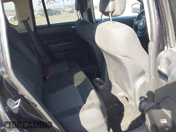 2011 Jeep Compass with VIN 1J4NT1FA7BD208658, listed as a IAAI auction lot 41795085 with 198,880 mi miles. Bid and sale history available at carsss.com. Image 8.