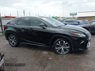 2016 Lexus RX 350 z VIN 2T2ZZMCA6GC005692, wystawiony jako IAAI lot #42147337 z przebiegiem 132 363 mil mil oraz . Historia ofert i sprzedaży dostępna na DreamBid. Obrazek 13.