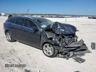 2015 Volvo V60 T5 Drive-E Premier with VIN YV140MEK7F1251940, listed as a Copart auction lot 73695834 with 143,663 mi miles and Salvage Title. Bid and sale history available at carsss.com. Image 4.
