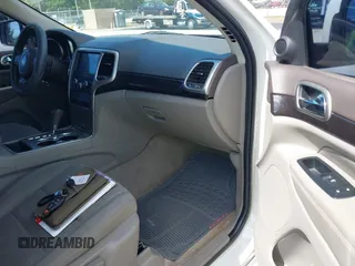 2011 Jeep Grand Cherokee Laredo with VIN 1J4RS4GG0BC573388, listed as a IAAI auction lot 42167064 with 63,363 mi miles and . Bid and sale history available at DreamBid. Image 5.