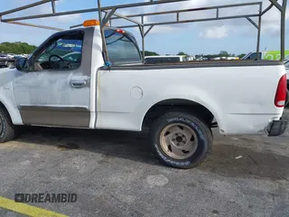 2002 Ford F-150 XL with VIN 1FTRF17W52NB71693, listed as a IAAI auction lot 41952405 with 121,917 mi miles. Bid and sale history available at carsss.com. Image 6.