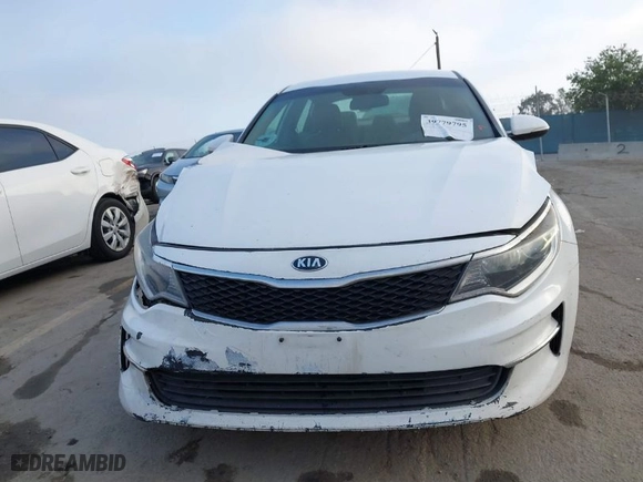 2016 Kia Optima LX with VIN 5XXGT4L34GG084299, listed as a IAAI auction lot 39779795 with 237,126 mi miles. Bid and sale history available at carsss.com. Image 12.
