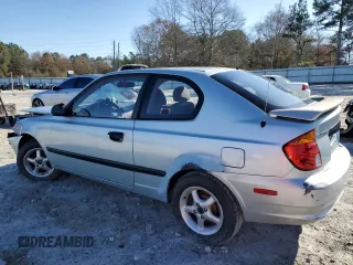 2003 Hyundai Accent with VIN KMHCF35C73U273610, listed as a Copart auction lot 85868294 with 168,203 mi miles and Salvage Title. Bid and sale history available at carsss.com. Image 2.