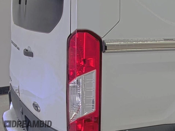 2018 Ford Transit z VIN 1FTYR1YG6JKA87506, wystawiony jako IAAI lot #42501070 z przebiegiem 167 892 mil mil oraz . Historia ofert i sprzedaży dostępna na DreamBid. Obrazek 6.