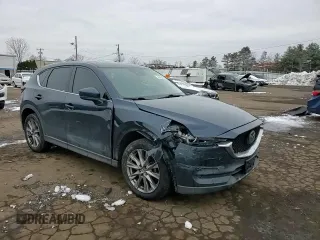 2019 Mazda CX-5 Grand Touring with VIN JM3KFBDM6K0667925, listed as a Copart auction lot 44657565 with 71,359 mi miles and Salvage Title. Bid and sale history available at carsss.com. Image 12.