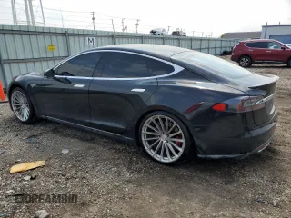 2014 Tesla Model S 60 with VIN 5YJSA1H11EFP36611, listed as a Copart auction lot 59544085 with 97,214 mi miles and Salvage title. Bid and sale history available at DreamBid. Image 2.