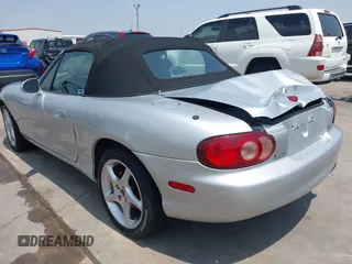 2002 Mazda MX-5 Miata Cloth z VIN JM1NB353020225252, wystawiony jako IAAI lot #42303820 z przebiegiem 194 549 mil mil oraz . Historia ofert i sprzedaży dostępna na DreamBid. Obrazek 3.