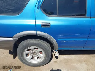 2001 Isuzu Rodeo S with VIN 4S2CK58W014315005, listed as a IAAI auction lot 41880618 with 147,384 mi miles. Bid and sale history available at carsss.com. Image 6.