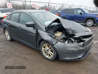 2018 Ford Focus SE z VIN 1FADP3F23JL298265, wystawiony jako IAAI lot #42005754 z przebiegiem 134 721 mil mil oraz . Historia ofert i sprzedaży dostępna na DreamBid. Obrazek 1.