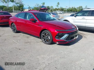 2024 Hyundai Sonata SEL z VIN KMHL64JA4RA386001, wystawiony jako IAAI lot #42030390 z przebiegiem 2 234 mil mil oraz . Historia ofert i sprzedaży dostępna na DreamBid. Obrazek 1.