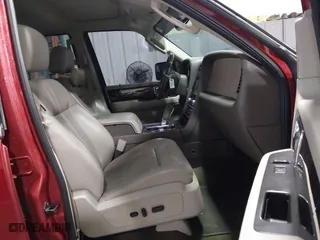2015 Lincoln Navigator with VIN 5LMJJ2JT5FEJ11296, listed as a IAAI auction lot 41233028 with 189,509 mi miles. Bid and sale history available at carsss.com. Image 5.