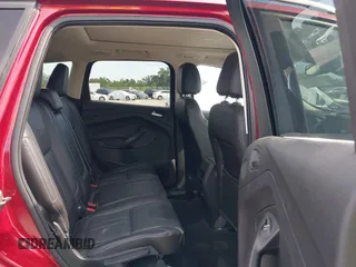 2013 Ford Escape Titanium with VIN 1FMCU0J98DUC93235, listed as a IAAI auction lot 42253289 with 107,030 mi miles and . Bid and sale history available at DreamBid. Image 8.