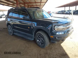 2023 Ford Bronco Sport Badlands z VIN 3FMCR9D91PRE08657, wystawiony jako IAAI lot #42077119 z przebiegiem 159 602 mil mil oraz . Historia ofert i sprzedaży dostępna na DreamBid. Obrazek 1.