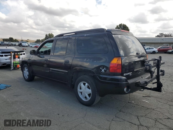 2003 GMC Envoy SLT with VIN 1GKES16SX36220489, listed as a Copart auction lot 71859834 with 148,811 mi miles and Salvage Title. Bid and sale history available at DreamBid. Image 2.