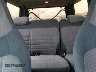 1996 Ford Explorer XL с VIN 1FMDU34X9TUC66723, выставлен на аукционе Copart как лот 86659774 с пробегом 190 164 миль миль и Списание • Salvage title. История ставок и продаж доступна на DreamBid. Изображение 10.