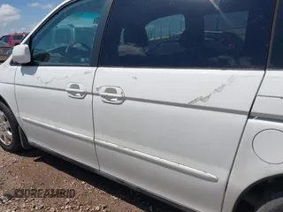 2003 Honda Odyssey EX-L with VIN 5FNRL18983B122294, listed as a IAAI auction lot 41922671 with 215,911 mi miles and . Bid and sale history available at DreamBid. Image 6.