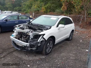 2018 Acura RDX w/Advance Pkg with VIN 5J8TB4H70JL009007, listed as a IAAI auction lot 40382722 with 104,933 mi miles. Bid and sale history available at carsss.com. Image 2.