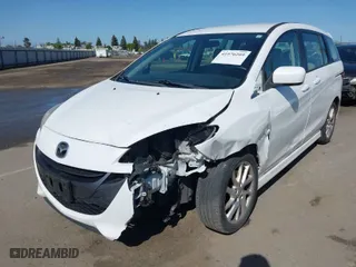 2012 Mazda Mazda5 Touring with VIN JM1CW2CL7C0140452, listed as a IAAI auction lot 41970209 with 92,069 mi miles. Bid and sale history available at carsss.com. Image 2.