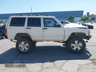 1998 Jeep Cherokee Sport with VIN 1J4FJ68S4WL227094, listed as a IAAI auction lot 42361950 with Not provided miles and . Bid and sale history available at DreamBid. Image 13.