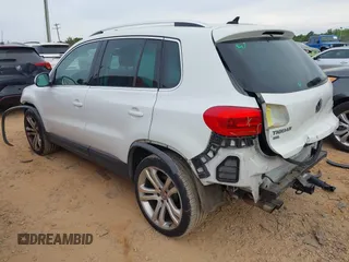 2016 Volkswagen Tiguan S with VIN WVGBV7AXXGW585445, listed as a IAAI auction lot 42083377 with 111,011 mi miles and . Bid and sale history available at DreamBid. Image 3.