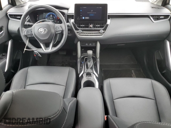 2024 Toyota Corolla Cross XLE with VIN 7MUDAAAG8RV095021, listed as a Copart auction lot 59232265 with 7,010 mi miles and Salvage title. Bid and sale history available at DreamBid. Image 8.