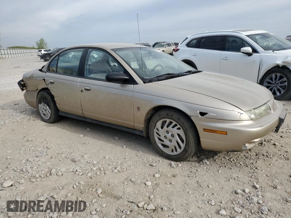 1999 Saturn SL с VIN 1G8ZK5278XZ269792, выставлен на аукционе Copart как лот 48773395 с пробегом 159 506 миль миль и Списание • Salvage title. История ставок и продаж доступна на DreamBid. Изображение 4.
