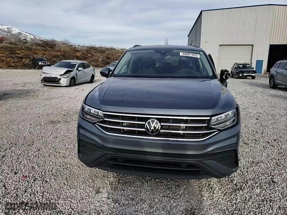 2022 Volkswagen Tiguan S with VIN 3VV0B7AX2NM038768, listed as a Copart auction lot 48081425 with 77,065 mi miles and Salvage Title. Bid and sale history available at carsss.com. Image 11.