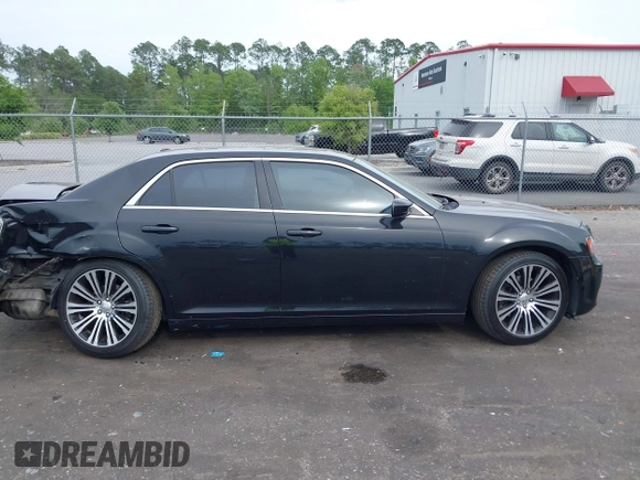 2013 Chrysler 300 with VIN 2C3CCABT2DH735764, listed as a IAAI auction lot 41977616 with 164,517 mi miles. Bid and sale history available at carsss.com. Image 13.