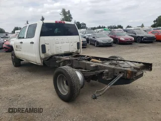 2015 GMC Sierra 1500 with VIN 1GD411CG3FF648494, listed as a Copart auction lot 67523504 with 133,250 mi miles and Salvage Title. Bid and sale history available at DreamBid. Image 2.