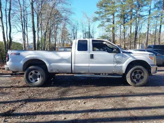 2015 Ford Super Duty F-250 SRW XLT with VIN 1FT7X2BT2FED37097, listed as a IAAI auction lot 41084977 with 224,317 mi miles. Bid and sale history available at carsss.com. Image 14.