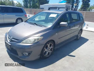 2008 Mazda 5 Grand Touring z VIN JM1CR29L680307325, wystawiony jako IAAI lot #42267347 z przebiegiem 151 415 mil mil oraz . Historia ofert i sprzedaży dostępna na DreamBid. Obrazek 2.