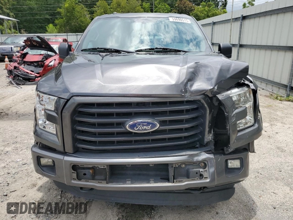 2015 Ford F-150 XLT with VIN 1FTEW1EG8FFC03207, listed as a Copart auction lot 59690515 with 261,153 mi miles and Salvage title. Bid and sale history available at DreamBid. Image 5.