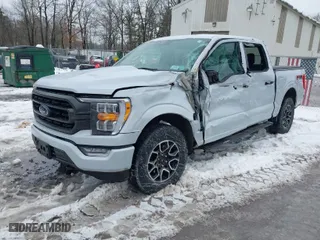 2021 Ford F-150 XL with VIN 1FTFW1E55MKD88680, listed as a IAAI auction lot 41552031 with 62,019 mi miles. Bid and sale history available at carsss.com. Image 2.