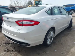 2016 Ford Fusion SE with VIN 3FA6P0T99GR268237, listed as a IAAI auction lot 41951459 with 117,309 mi miles. Bid and sale history available at carsss.com. Image 4.