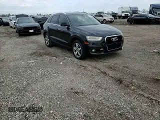2015 Audi Q3 Premium Plus z VIN WA1BFCFS9FR002457, wystawiony jako Copart lot #87422994 z przebiegiem 135 890 mil mil oraz Szkoda całkowita • Salvage title. Historia ofert i sprzedaży dostępna na DreamBid. Obrazek 11.