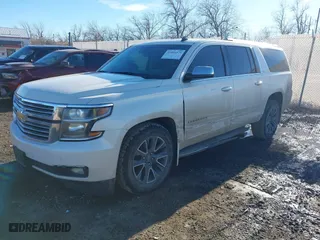 2015 Chevrolet Suburban LTZ with VIN 1GNSKKKCXFR128490, listed as a IAAI auction lot 41461579 with 260,669 mi miles. Bid and sale history available at carsss.com. Image 17.
