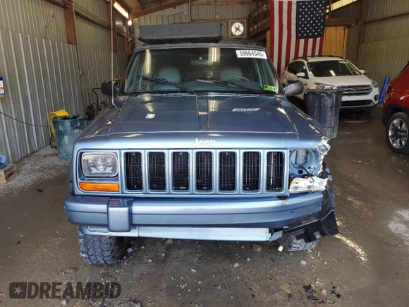 1998 Jeep Cherokee Country with VIN 1J4FT78S8WL252502, listed as a Copart auction lot 59664545 with 133,148 mi miles and Salvage title. Bid and sale history available at DreamBid. Image 5.