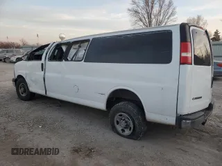 2014 Chevrolet Express Passenger LT with VIN 1GAZG1FGXE1187397, listed as a Copart auction lot 43209785 with 168,614 mi miles and Salvage title. Bid and sale history available at DreamBid. Image 2.