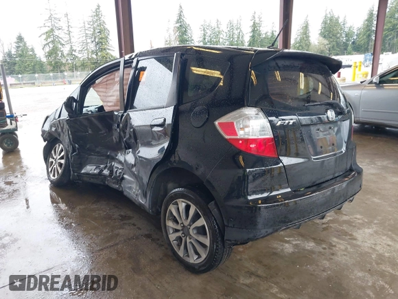 2013 Honda Fit Sport with VIN JHMGE8H57DC033384, listed as a IAAI auction lot 41871356 with 150,777 mi miles. Bid and sale history available at carsss.com. Image 3.
