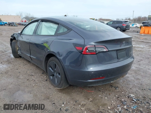 2022 Tesla Model 3 Long Range with VIN 5YJ3E1EB8NF201023, listed as a IAAI auction lot 41942943 with 30,635 mi miles and . Bid and sale history available at DreamBid. Image 3.