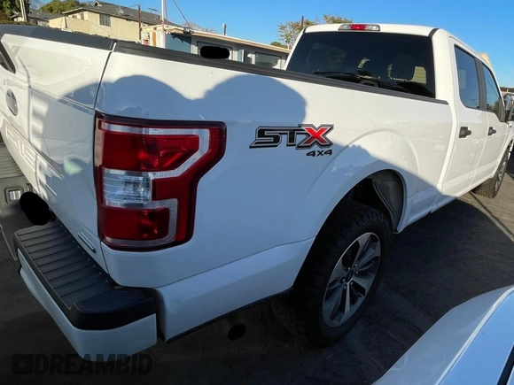 2019 Ford F-150 XL with VIN 1FTFW1E45KKD51312, listed as a Copart auction lot 49357265 with 142,521 mi miles and Clean Title. Bid and sale history available at DreamBid. Image 4.