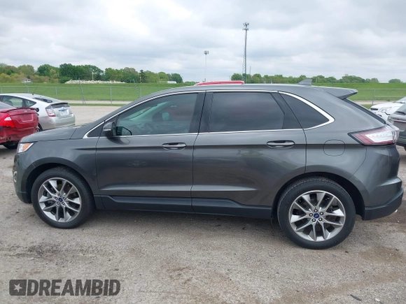 2015 Ford Edge Titanium z VIN 2FMTK3K81FBB88882, wystawiony jako IAAI lot #42184698 z przebiegiem 161 858 mil mil oraz . Historia ofert i sprzedaży dostępna na DreamBid. Obrazek 14.