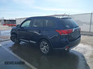 2016 Mitsubishi Outlander SE with VIN JA4AZ3A32GZ064867, listed as a IAAI auction lot 41599000 with 113,159 mi miles and . Bid and sale history available at DreamBid. Image 3.