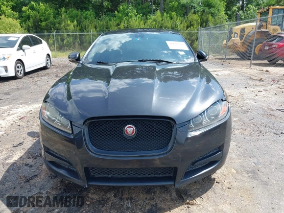 2015 Jaguar XF V6 Portfolio with VIN SAJWA0F74F8U76324, listed as a IAAI auction lot 42158134 with 136,995 mi miles. Bid and sale history available at carsss.com. Image 6.