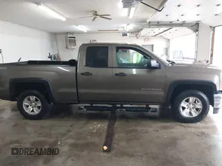 2014 Chevrolet Silverado 1500 LT with VIN 1GCVKREC5EZ147506, listed as a IAAI auction lot 41736960 with 112,399 mi miles and . Bid and sale history available at DreamBid. Image 14.