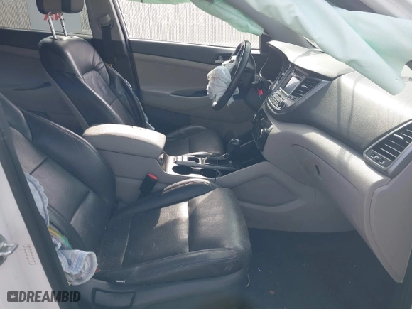 2017 Hyundai Tucson Value with VIN KM8J33A27HU564306, listed as a IAAI auction lot 40983257 with 53,590 mi miles. Bid and sale history available at carsss.com. Image 5.