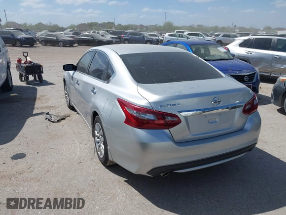 2018 Nissan Altima SV with VIN 1N4AL3AP1JC298556, listed as a IAAI auction lot 41809072 with 57,557 mi miles and . Bid and sale history available at DreamBid. Image 3.