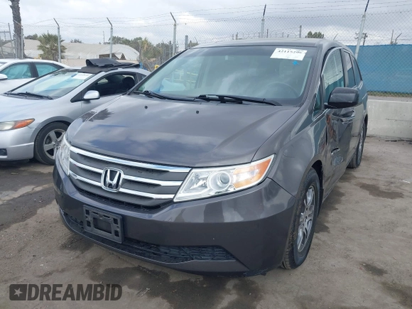 2011 Honda Odyssey EX-L with VIN 5FNRL5H61BB072124, listed as a IAAI auction lot 42115299 with 155,086 mi miles and . Bid and sale history available at DreamBid. Image 2.